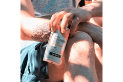 Image Man holding a carton.